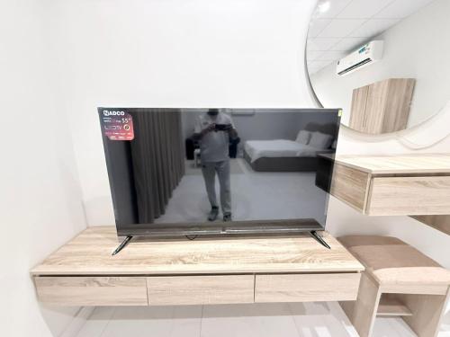 TV a/nebo společenská místnost v ubytování استديو نايف 1