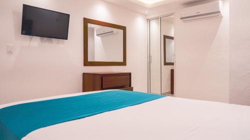 Postel nebo postele na pokoji v ubytování Cataleya Hotel
