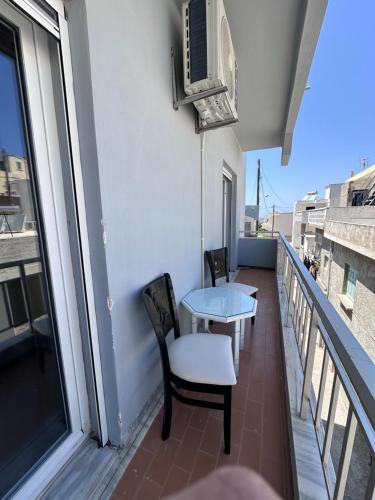 Балкон или терраса в Dionisia sunshine view house with gym