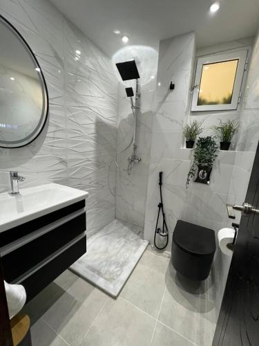 Un baño de Charmant appart en face du stade