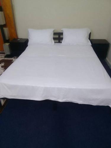 Postel nebo postele na pokoji v ubytování PARADISEs