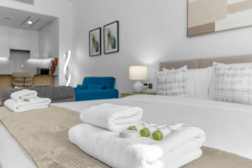 Llit o llits en una habitació de Modern Studio In Jlt Cluster L Top Facilities