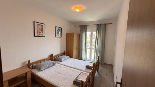 Postel nebo postele na pokoji v ubytování Family apartment Krivokapic