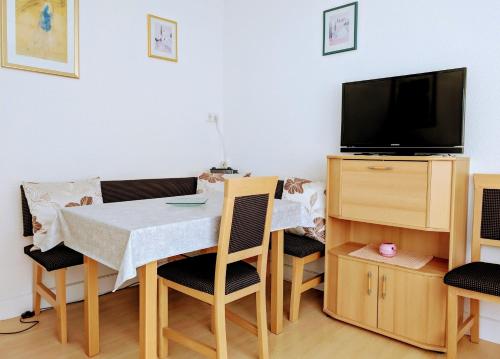TV a/nebo společenská místnost v ubytování Fewo Hasenhorn