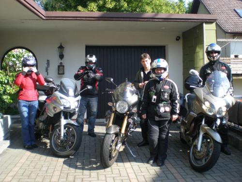a group of people standing next to their motorcycles at Hotel Pension Heidi in Dobel