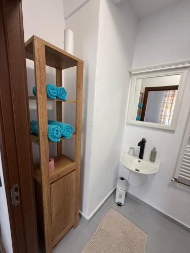 a bathroom with a toilet and a sink at Vadim's guesthouse in Sibiu