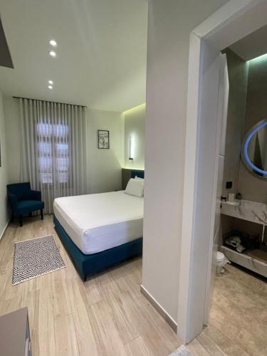Postel nebo postele na pokoji v ubytování The cosy inn vlora