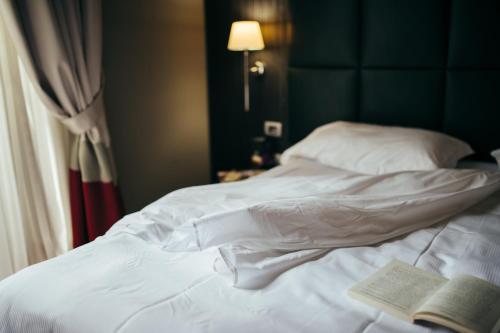 Hotel Porta Felice & Spaにあるベッド
