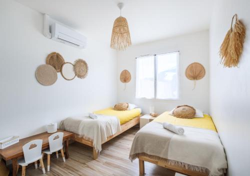 Postel nebo postele na pokoji v ubytování Villa Hélène