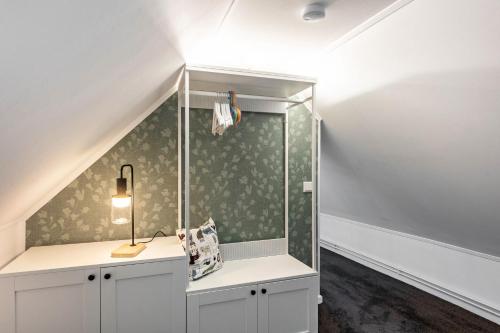 a bathroom with a shower in the corner of a room at Tannenhäuschen Sauerland in Schmallenberg