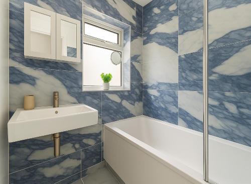Ένα μπάνιο στο Cosy Double Room in Southfields