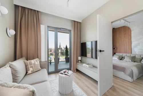 Postel nebo postele na pokoji v ubytování Noho Central Spodek, sauna, parking, siłownia