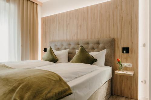 Postel nebo postele na pokoji v ubytování Familienhotel Friedrichshof