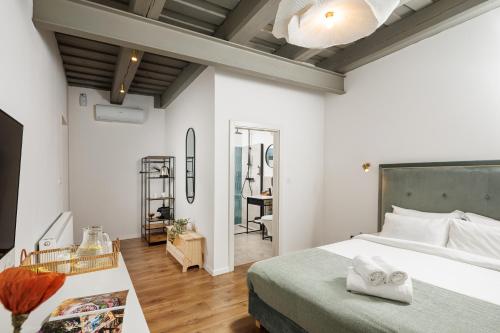 Ένα ή περισσότερα κρεβάτια σε δωμάτιο στο Richter Residence