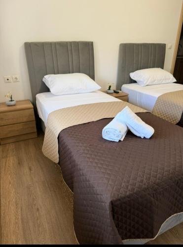Ένα ή περισσότερα κρεβάτια σε δωμάτιο στο Serenity apartment sea view