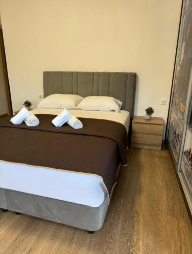 Ένα ή περισσότερα κρεβάτια σε δωμάτιο στο Serenity apartment sea view