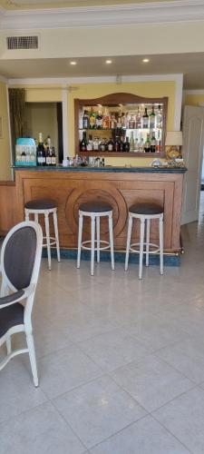Ο χώρος του lounge ή του μπαρ στο Villa Daphne