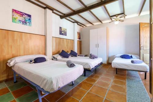 Postel nebo postele na pokoji v ubytování Cortijo rural los Erales