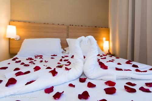 
A bed or beds in a room at Rede Andrade Bello Mare Comfort
