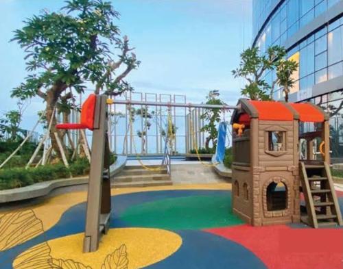 a playground in a building with a play house at Apartment 2BR Amor Pakuwon City Mall Surabaya Indonesia in Surabaya