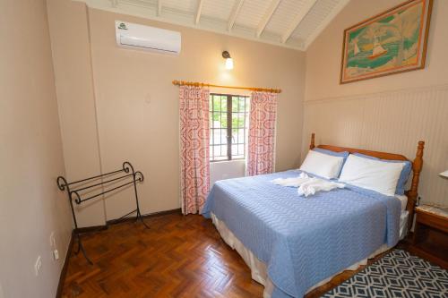 Katil atau katil-katil dalam bilik di Hibiscus House