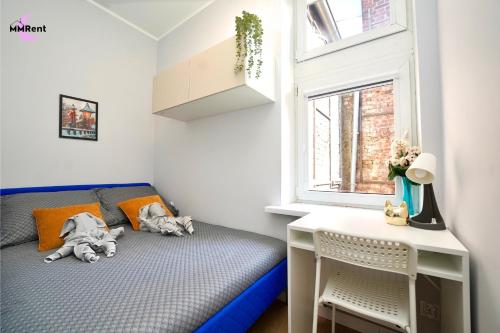 Giường trong phòng chung tại MMRent Kitty Cat Room