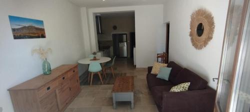 Posezení v ubytování Bel appartement du centre ancien