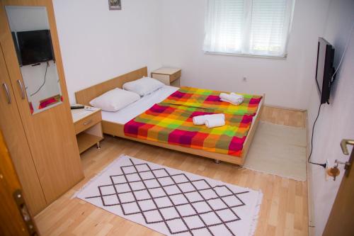 Postel nebo postele na pokoji v ubytování Guesthouse Bajric