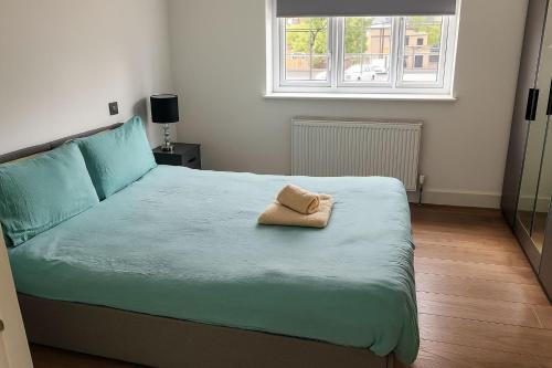 Ένα ή περισσότερα κρεβάτια σε δωμάτιο στο Central London Rooms