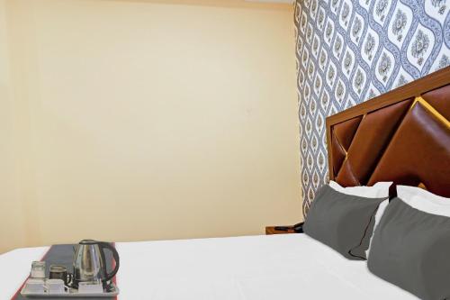 Ένα ή περισσότερα κρεβάτια σε δωμάτιο στο Hotel O Blue Diamond
