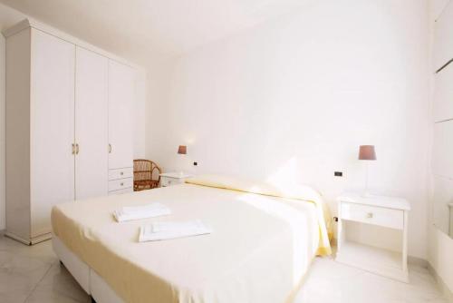 Katil atau katil-katil dalam bilik di Le Mura - Riviera Apartments