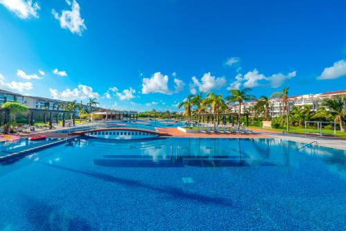 Bazén v ubytování Luxury 3 Bedroom Condo - Beachfront Complex at Mareazul - Buena Vida nebo v jeho okolí