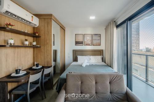 Katil atau katil-katil dalam bilik di Acomode-se com estilo e praticidade em Salvador – LIV