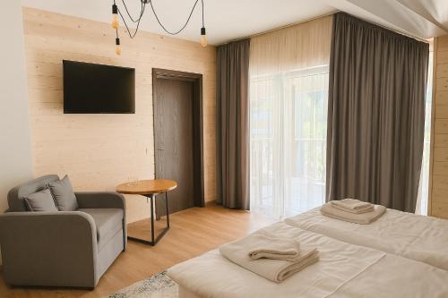 Una cama o camas en una habitación de Царська гора