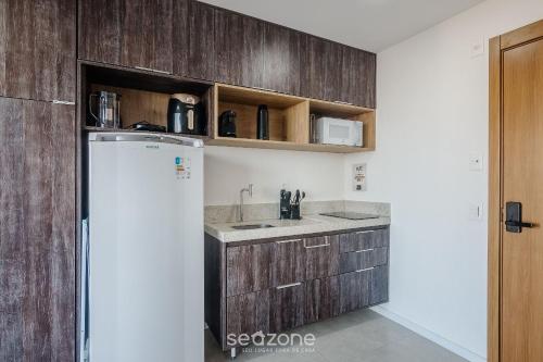 Dapur atau dapur kecil di Acomode-se com estilo e praticidade em Salvador – LIV