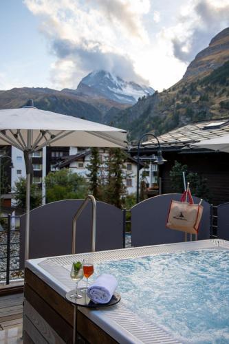Photo de la galerie de l'établissement Hotel AMBiANCE, à Zermatt