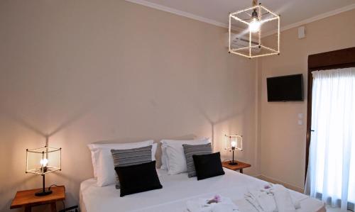 Katil atau katil-katil dalam bilik di The Beach House - Apartments & Studios