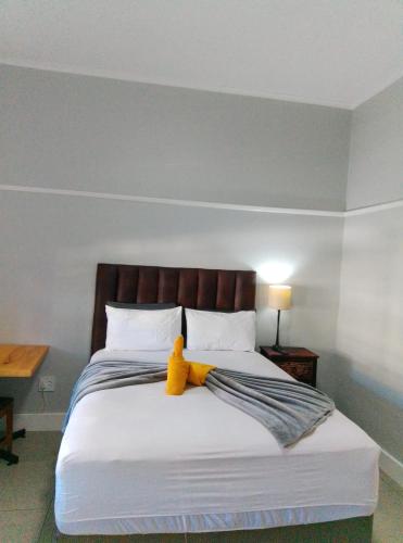 Katil atau katil-katil dalam bilik di Neo & Ruks Guest house parow 1