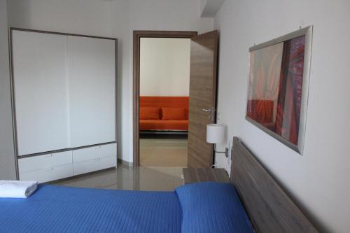 Ένα ή περισσότερα κρεβάτια σε δωμάτιο στο Ideal Residence & SPA
