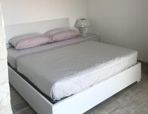 Posteľ alebo postele v izbe v ubytovaní Casa Maria