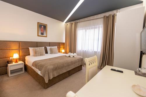 Letto o letti in una camera di Alko Hotel Shkoder