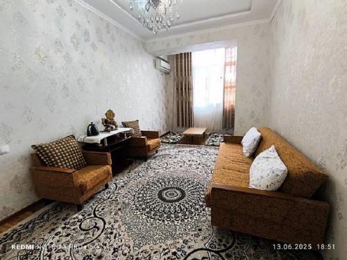 Posezení v ubytování Двухкомнатная квартира