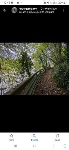 a screenshot of a picture of a trail with trees at The Garden Lodge in Cappoquin