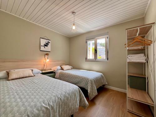 Postel nebo postele na pokoji v ubytování Valdeflores flats