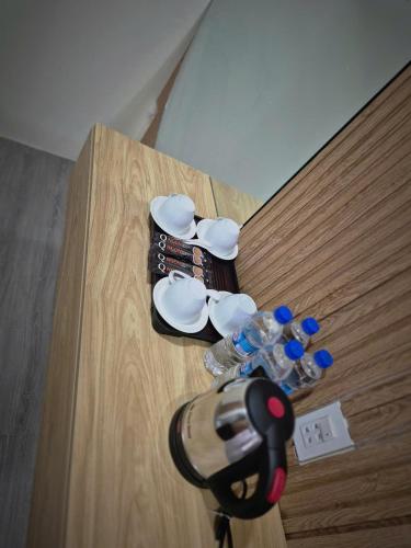 a close up of a table with a pair of scissors at Homestay The Sunset in Phan Thiet