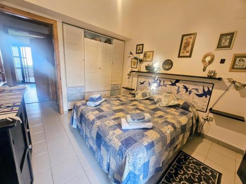 Ένα ή περισσότερα κρεβάτια σε δωμάτιο στο Sogno sul mare
