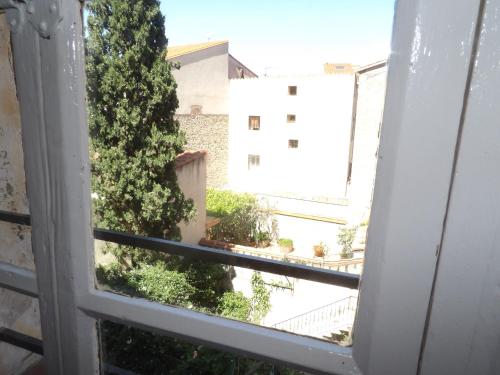 a view from the window of a building at Poppys in Céret