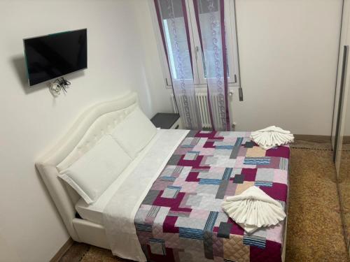 Cama o camas de una habitación en Venice Station Guest House