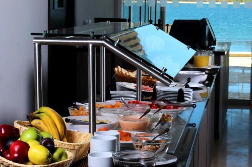 a buffet line with fruits and vegetables and other foods at Holiday Inn Resort Mazatlan by IHG in Mazatlán
