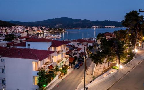 a view of a street in a city at night at Kaplanis House in Neos Marmaras